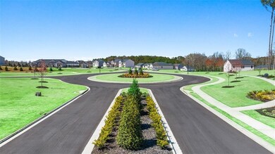 View of street with curbs, sidewalks, and a reside
