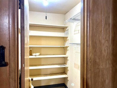 Large Closet in the garage that could be converted to a utility room.