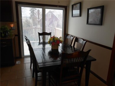 Dining area with slider to open air deck