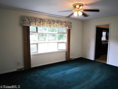 Exterior Front. Dining Room with bay window.