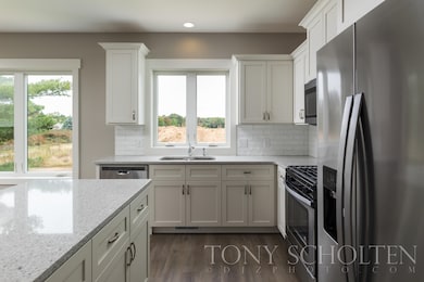 966 Harper Woods Dr SW unit 1, Byron Center, MI 49315 - photo 2