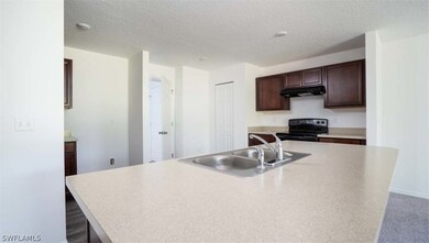 2710 NE 3rd Ave, Cape Coral, FL 33909 - photo 3