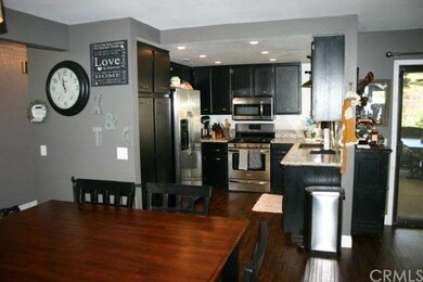 A look into the kitchen from the dining area. Noti
