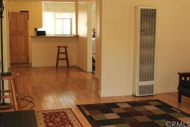 Living Room open to Dining Area and Kitchen
