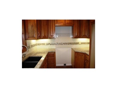 New cabinets, granite counter tops, and new tile b