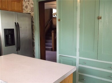 Original cabinetry exists to keep with the style o