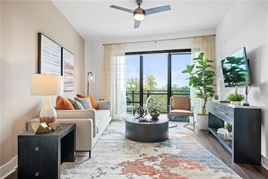 Living room featuring hardwood / wood-style floori