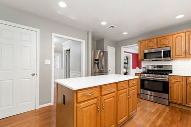 Beautiful Zodiac Carrera Quartz countertops.