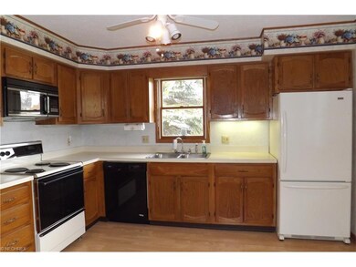 Fully applianced kitchen with oak cabinets and new