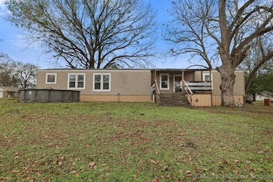 309 W 3rd St, Milburn, OK 73450 - photo 2