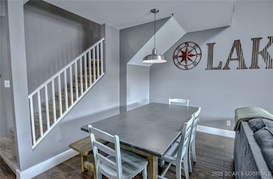 The dining room features a large table for 6 peopl