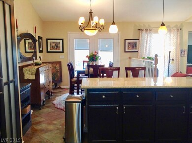 Dining Room with Custom Lighting, Tile Floors and