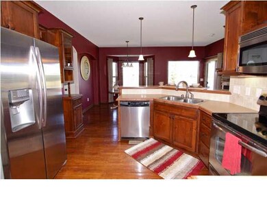 HARDWOOD FLOORS THRROUGOUT KITCHEN, DINING AND HEA