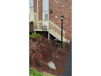 Exterior Front. Beautiful landscaping and new fron