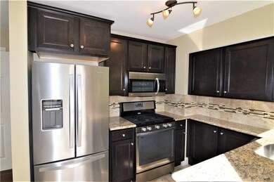 Completely updated kitchen with newer dark stained