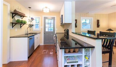 granite counters, stainless steel appliances, and 
