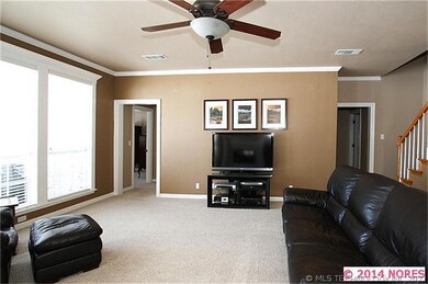 Family room has large windows, great lighting