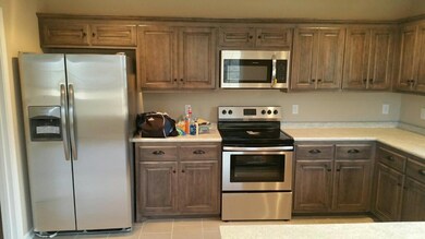 Cabinets & appliances that will be installed/ photo of a similar finished home