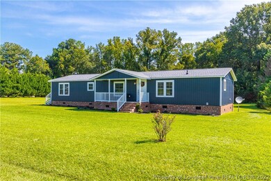 77 Artesian Spring Ln, Dunn, NC 28334 - photo 2