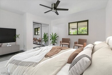 Bedroom with a closet, hardwood / wood-style floor