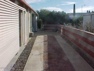 East side with patio at back