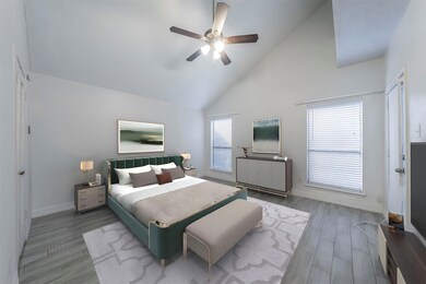 Bedroom featuring ceiling fan, high vaulted ceilin