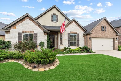 This home offers beautiful curb appeal including classic brick, stone and stucco elevation, custom landscaping, and a green front lawn easily watered by the automatic Rainbird sprinkler system.