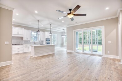 Unfurnished living room with light hardwood / wood