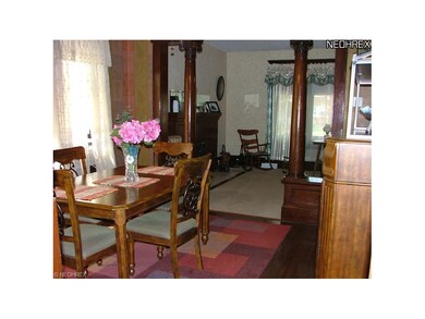 Dining room open to the living room with original 