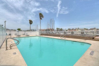 Outdoor pool overlooks a wide canal