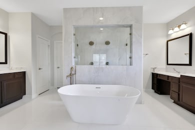 Luxury bath with freestanding tub, dual vanities,