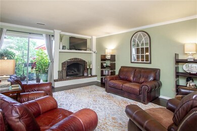 Arched brick fireplace adds character