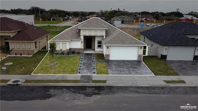 View of front of house featuring a front lawn, a residential view, stone siding, and roof with shingles