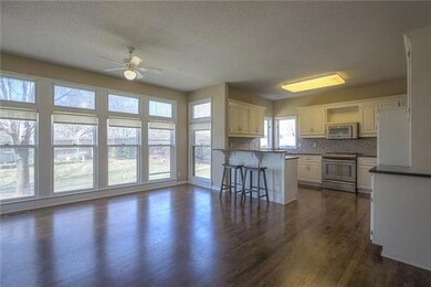 Bright and Cheery Kitchen with Hearth Room