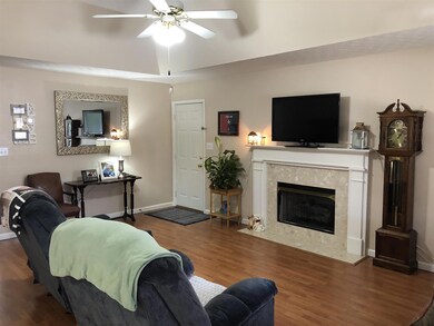 Living Room with Fireplace and Trey Ceiling