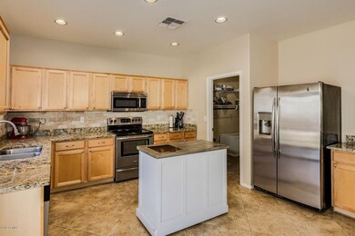 Bright kitchen with ss appliances