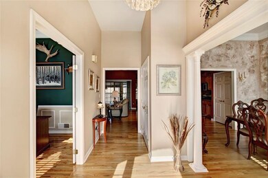 Center hall entry with detailed trim work