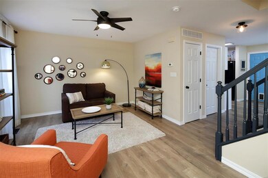 Living room flows to kitchen & dining area. Newer 