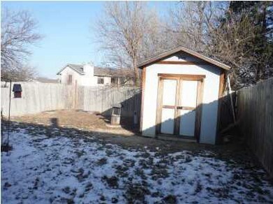Storage shed in backyard