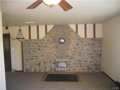 Large hearth with gas insert.