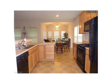 Enjoy the fully appliance kitchen that is open to 