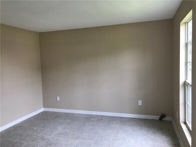 As you enter, you'll find a nice 14 x 12 living ro