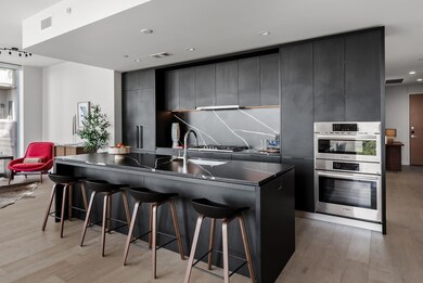Kitchen with modern cabinets, visible vents, ligh