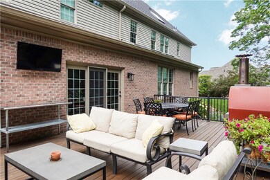 Great entertaining area with brick fireplace, outd