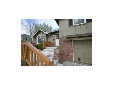 Newer drive and gorgeous entryway railing in front