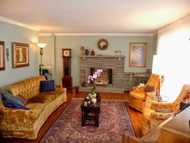 Living Room. Decorative stone fireplace.  Custom w