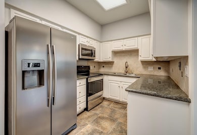 This kitchen features stainless steel appliances,