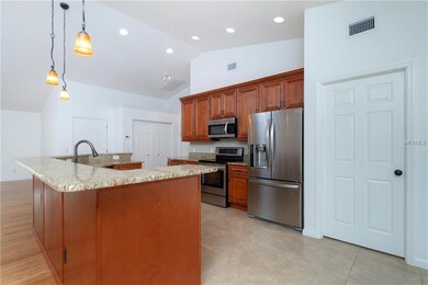 Kitchen shows stainless steel appliances and plent