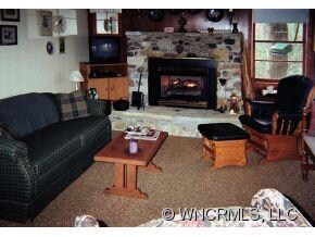 living area w/stone fireplace