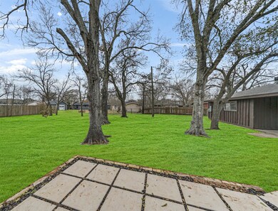 Great stone and rock patio out back of the house.